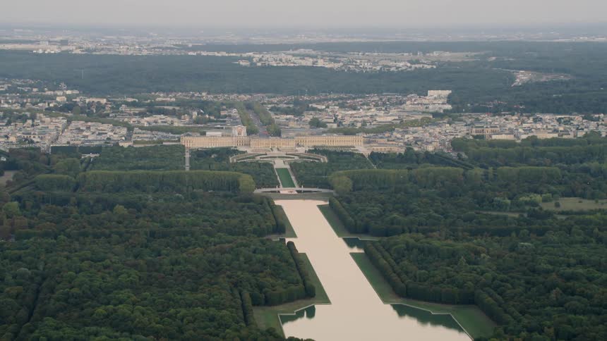 River flows through a tree covered city