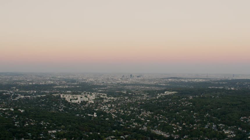 A sprawling forest at sunrise