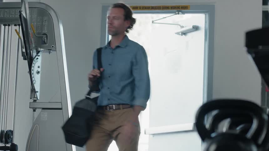Man walks into a gym
