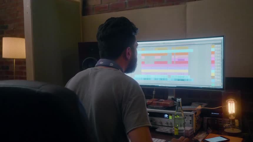 A man works at a computer