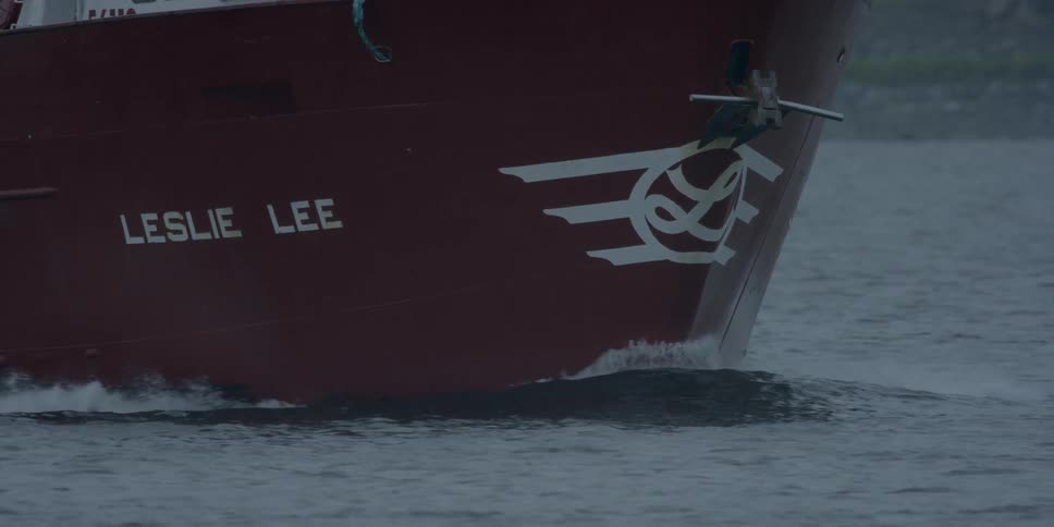 A ship bow pushes through water