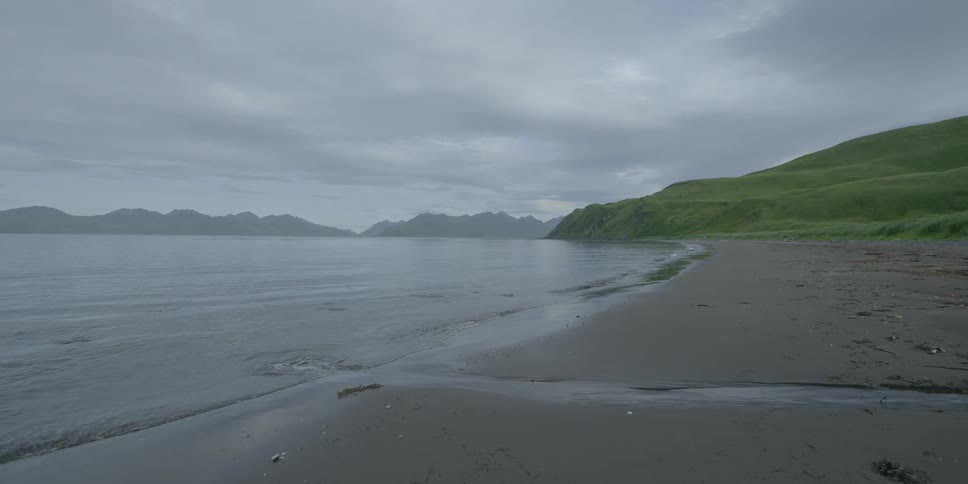 A small stream flows into the ocean
