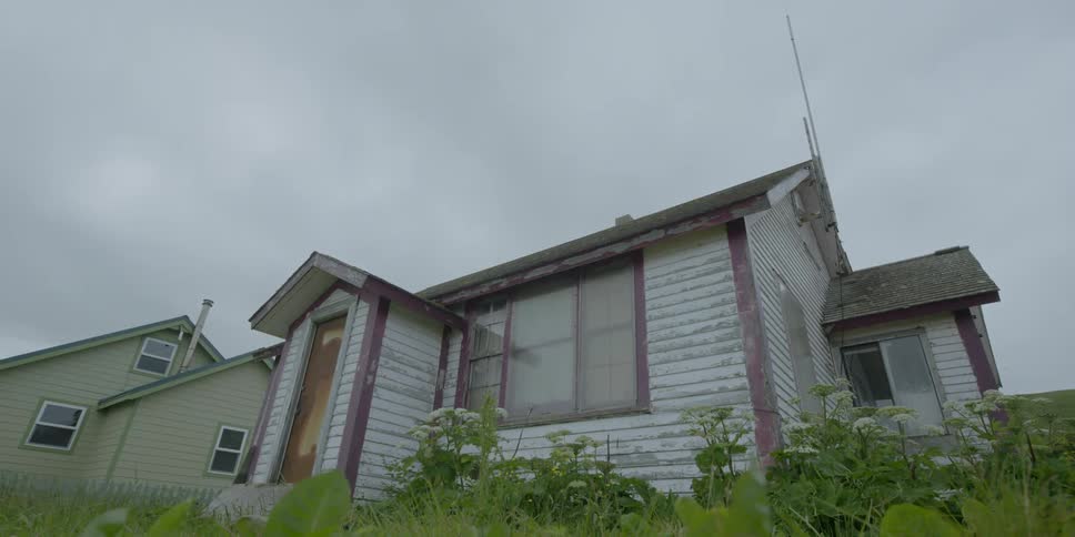 Weathered looking house on a cloudy day