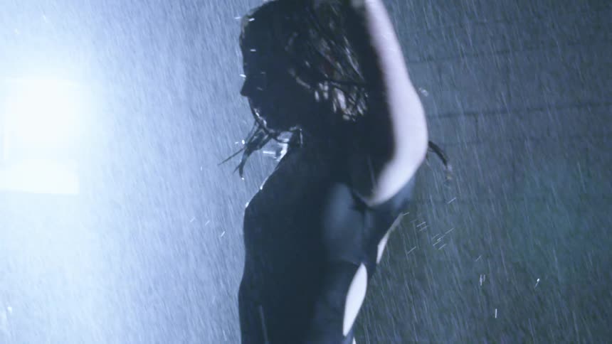 A person dancing in the rain