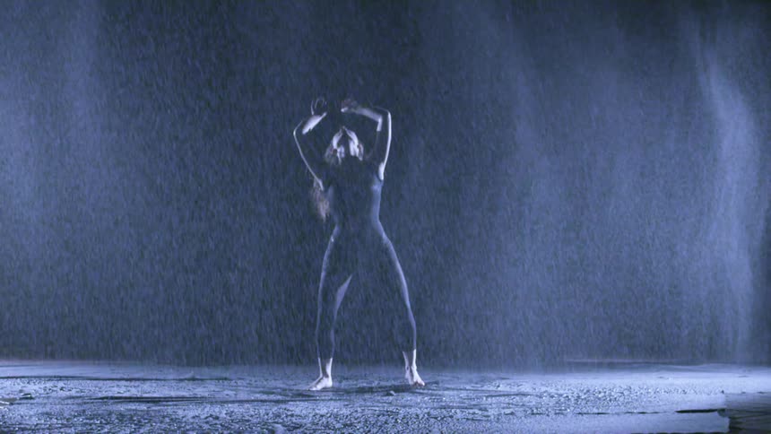 A person dancing in the rain