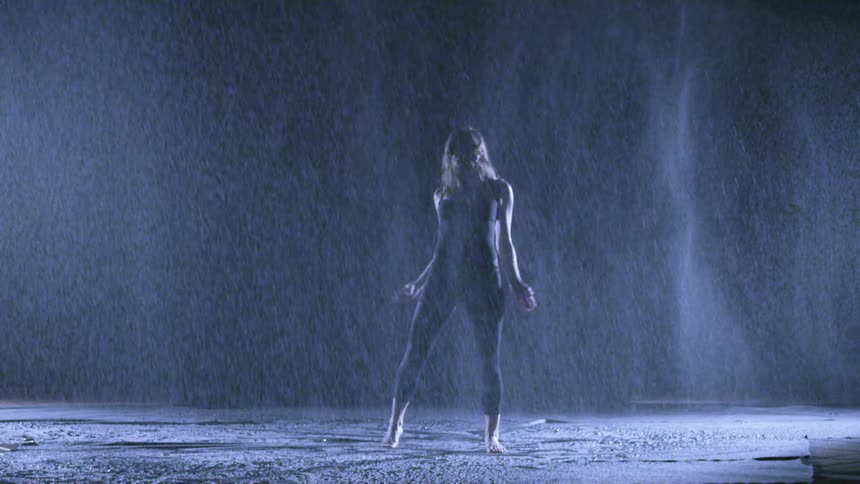 A person dancing in the rain