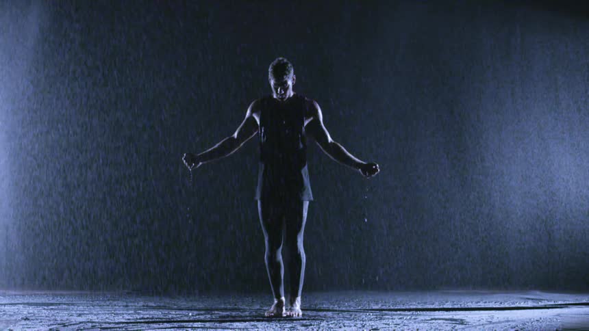 A person dancing in the rain