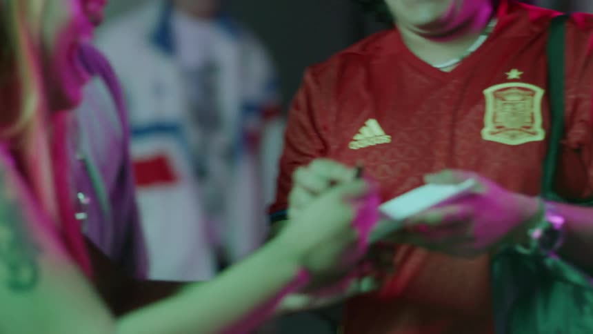Fans get autographs and photographs of a soccer player