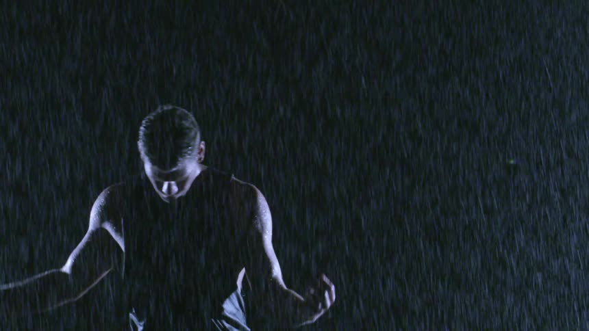 A person dancing in the rain