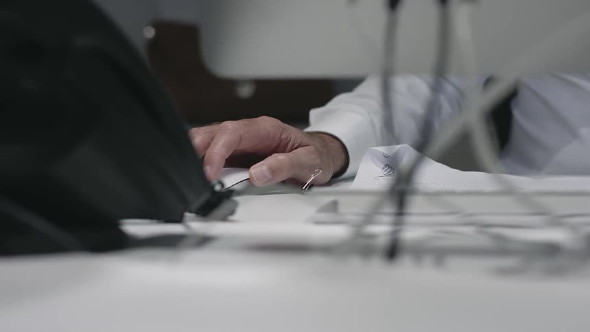A man works at a computer