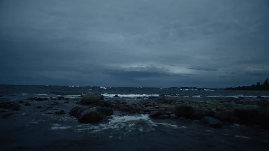 Waves roll onto a rocky shore