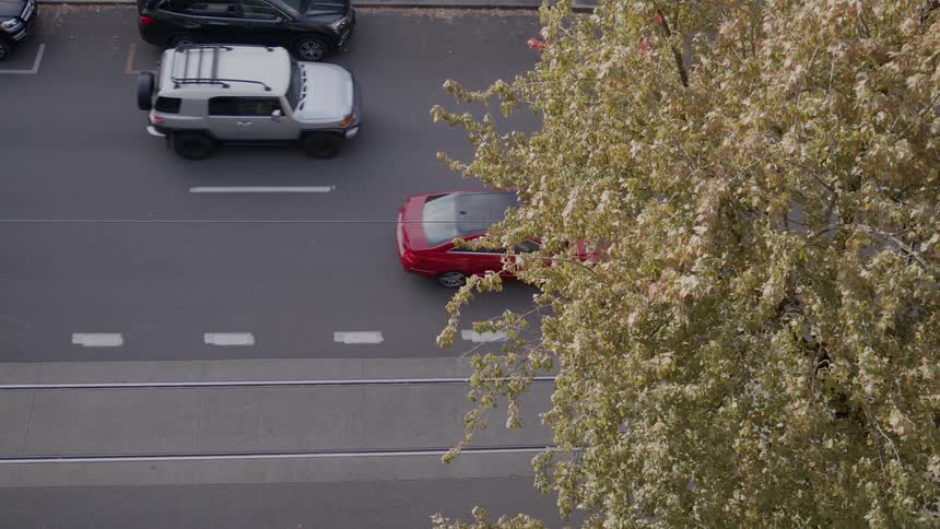 Cars drive on a street
