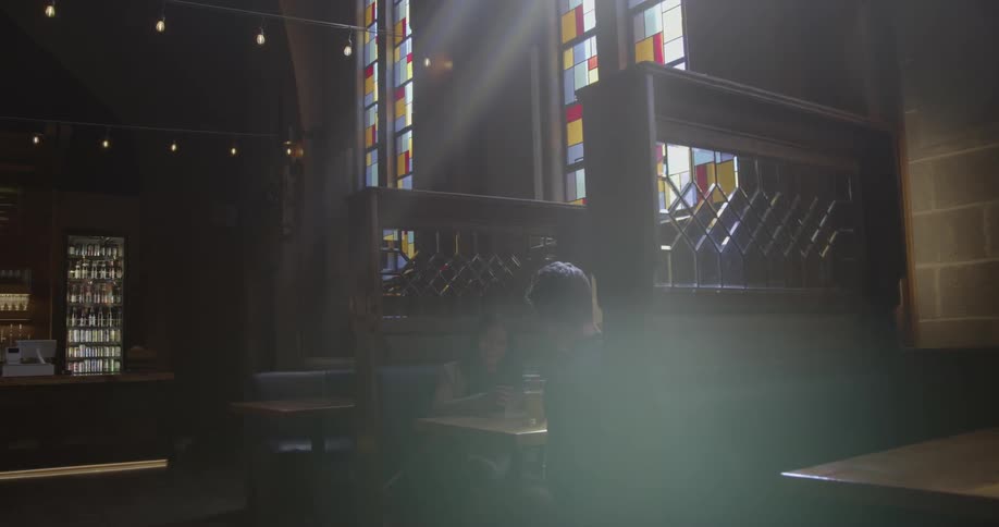 People are sitting down in a restaurant