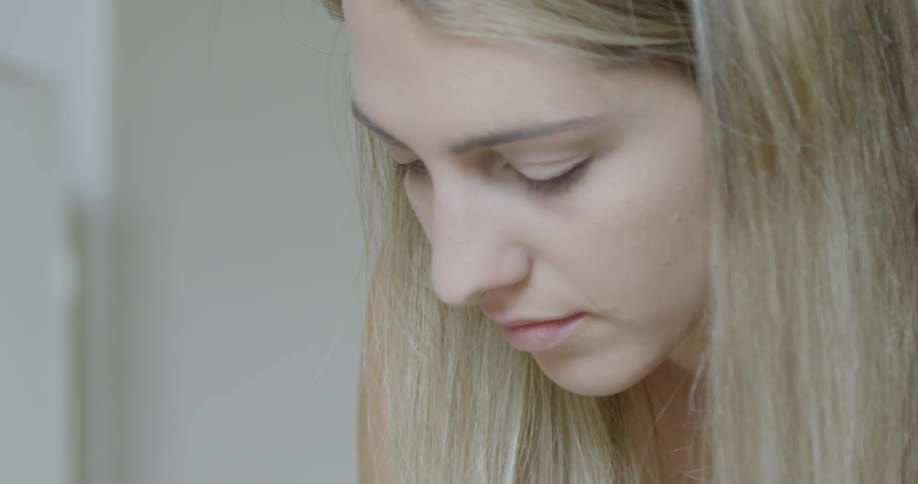 A person looking down at something