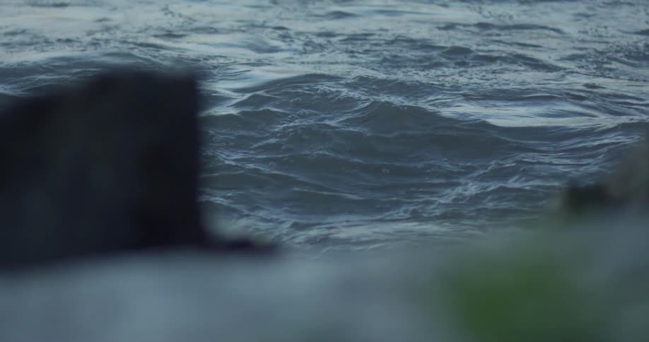 Waves rolling near rocks