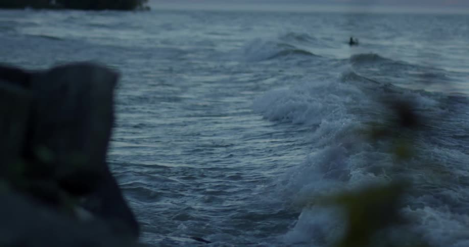 The waves slowly splash on the shore