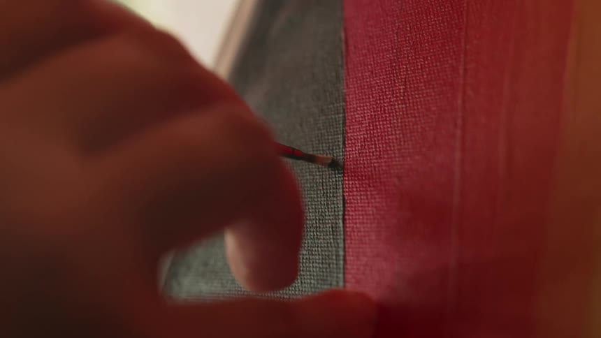 Someone is drawing on canvas