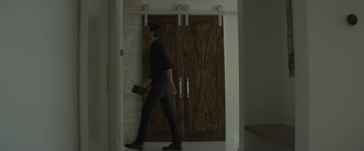 Man walks inside a house