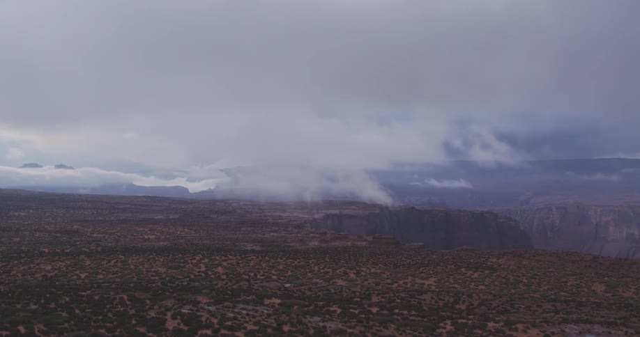 Clouds float over a mountain range