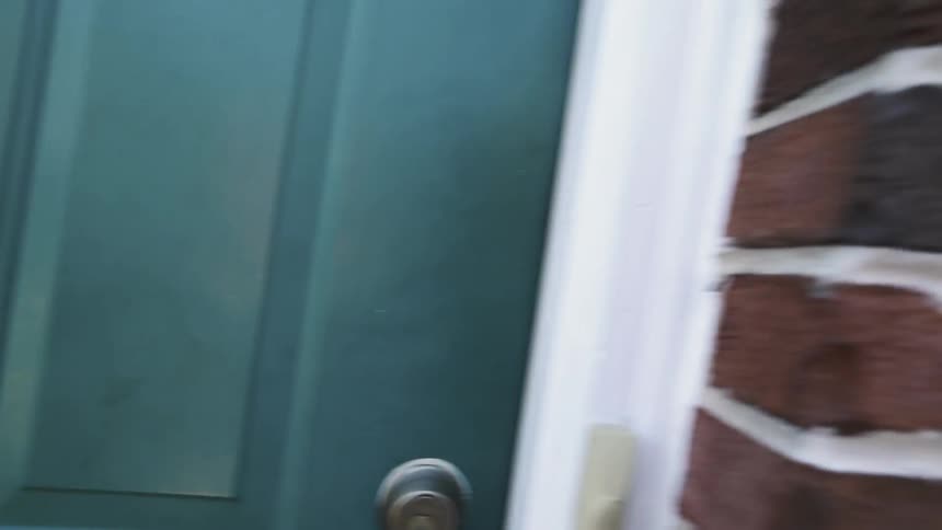 A person knocks on the door fast
