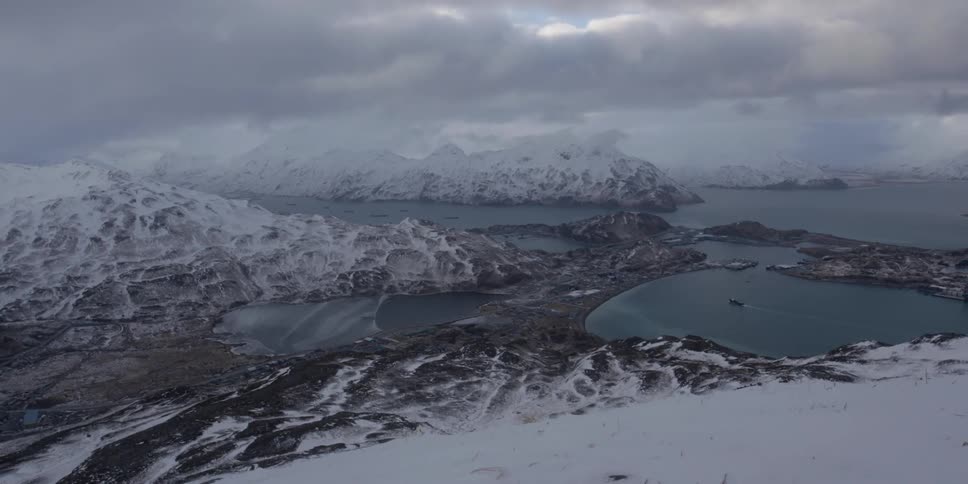 Icy mountains surrounded by lakes