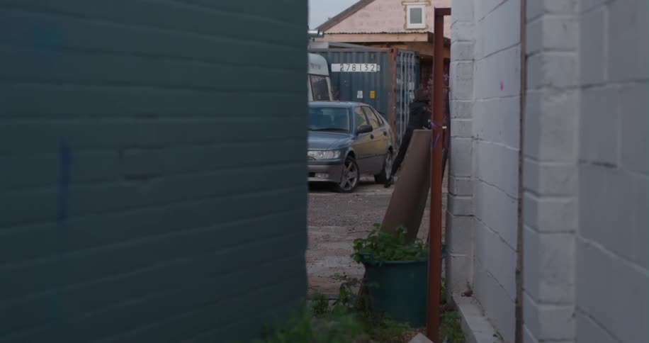 A woman walks down the lot