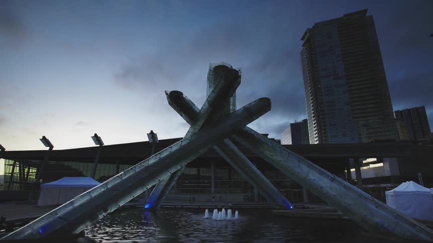 An artistic structure in front of a building