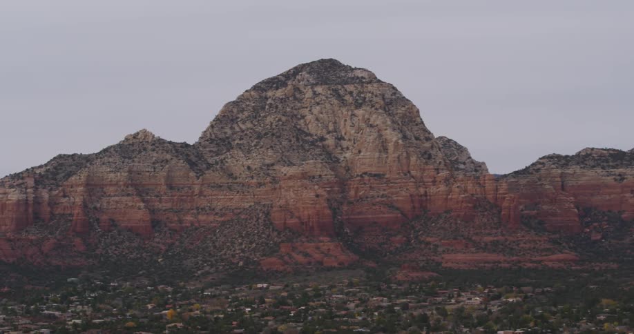A mountain looms in the desert