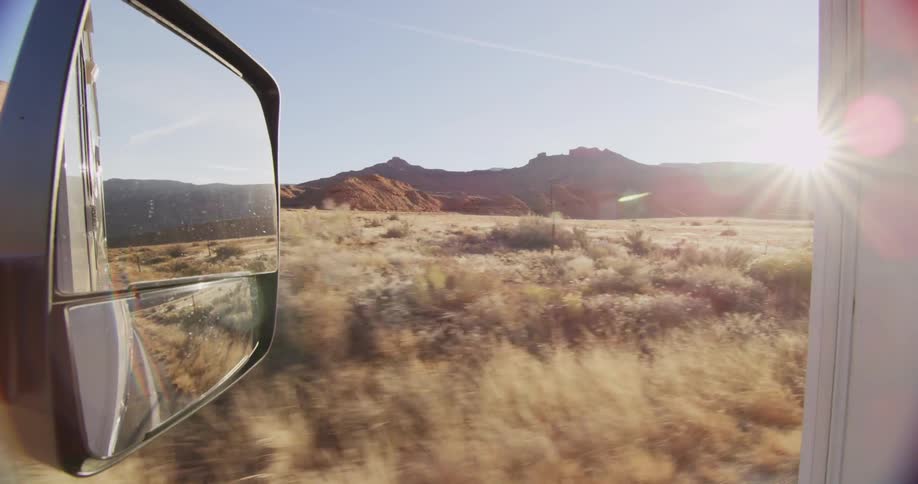 A car is driving outdoors
