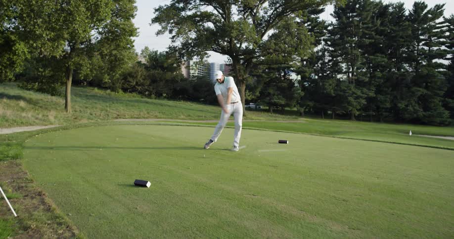 Man playing golf