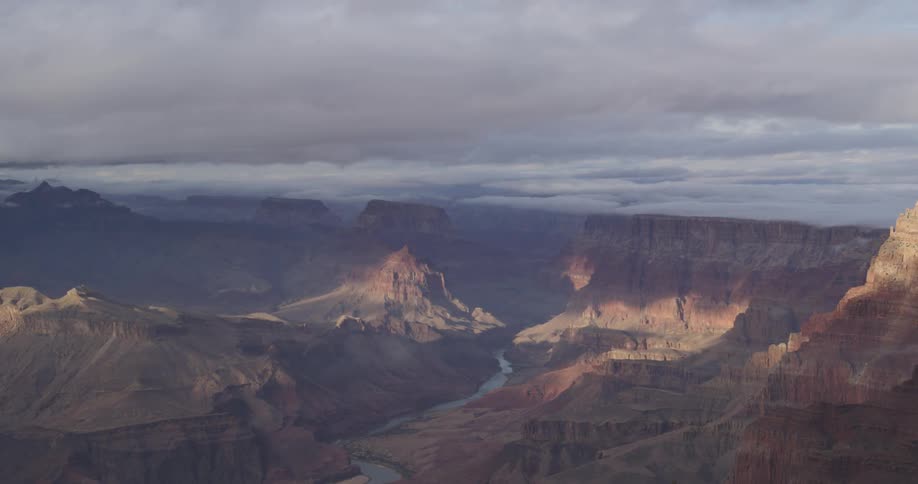 A narrow river runs through a canyon