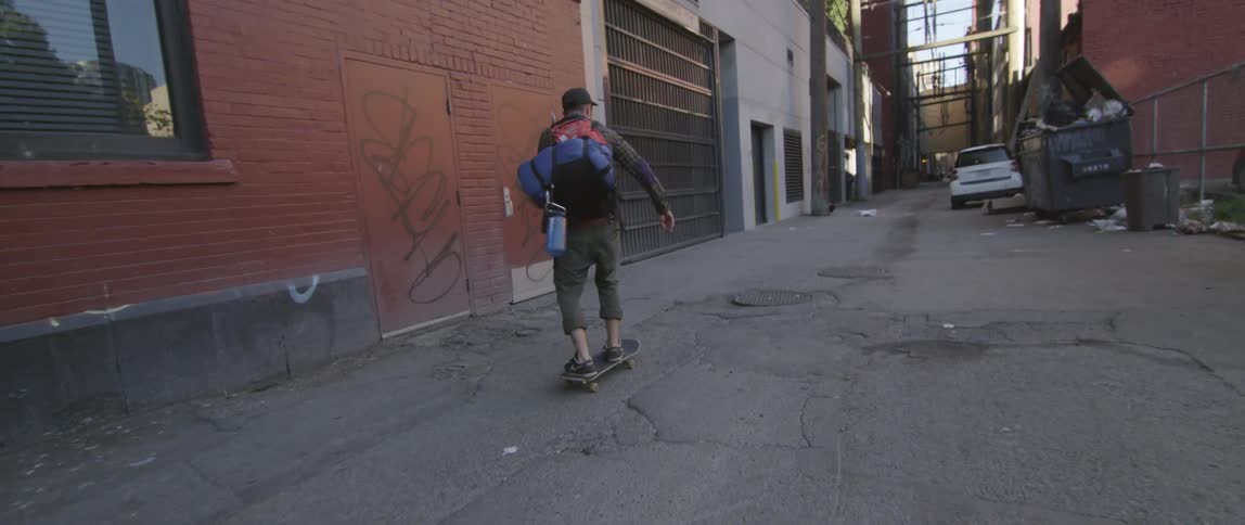 A person skateboarding outdoors