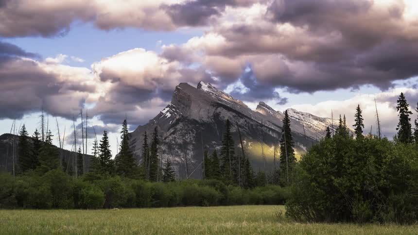 Spectacular clouds roll fast over the Rocky mountains in Banff, Canada