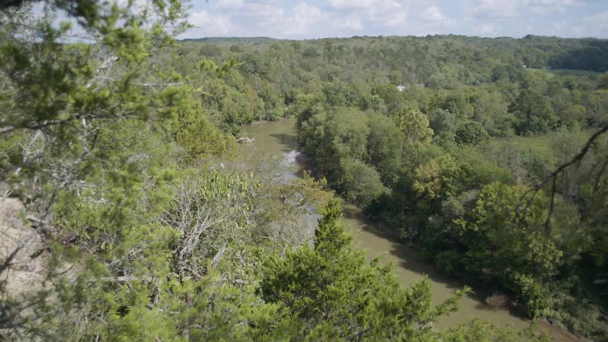Overlooking a river from a hillside