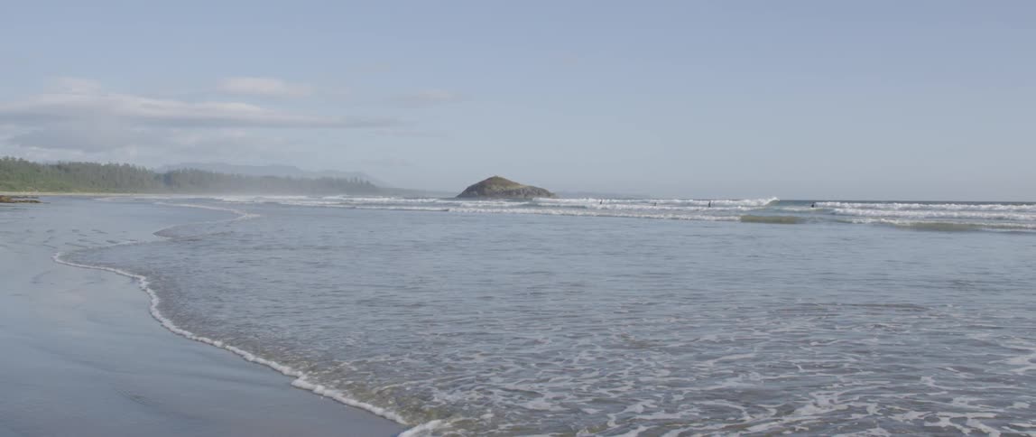 Waves crashing against the beach