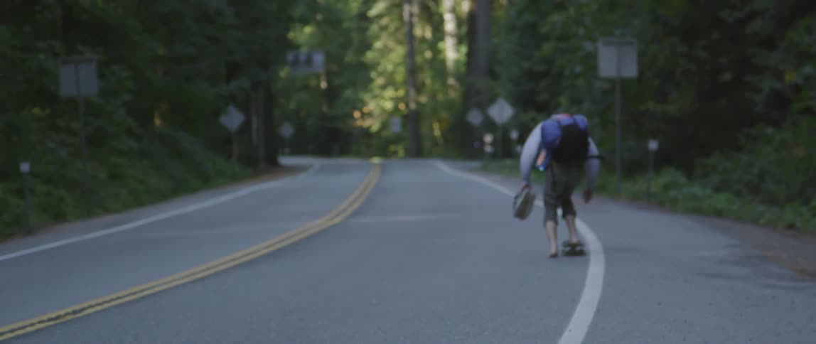 A person skateboarding outdoors