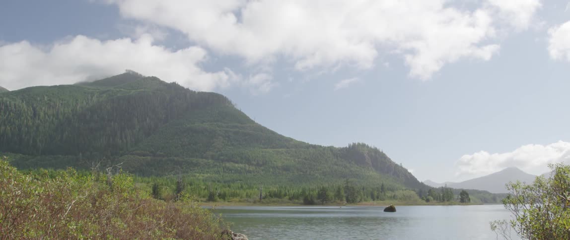 A river runs past a mountain