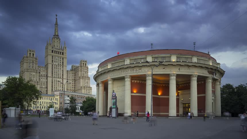 People walk around a square in Moscow