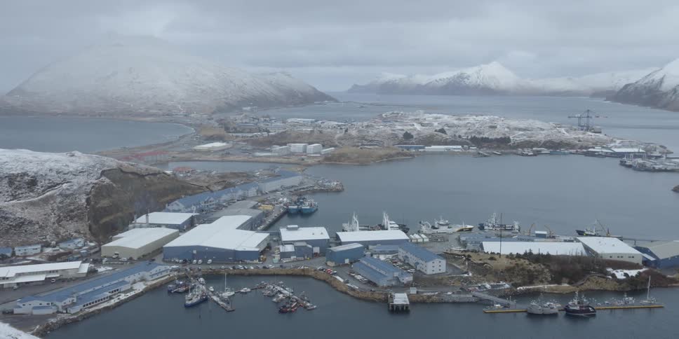 A seaside town is surrounded by water