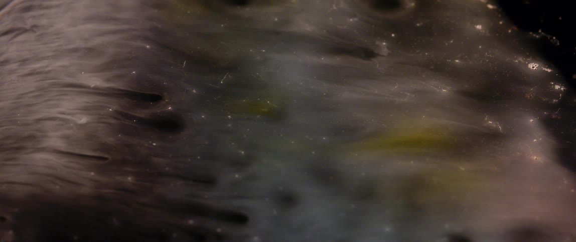 An abstract of swirling smoke and stars