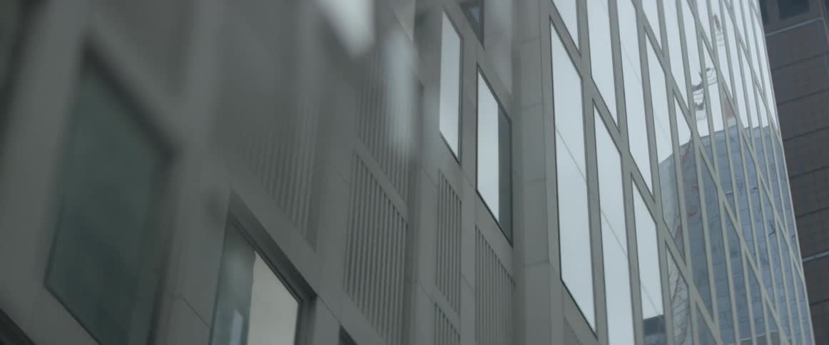 City buildings tower overhead