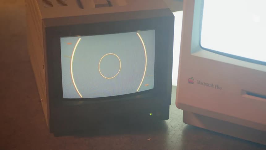 A television is flashing a circle pattern