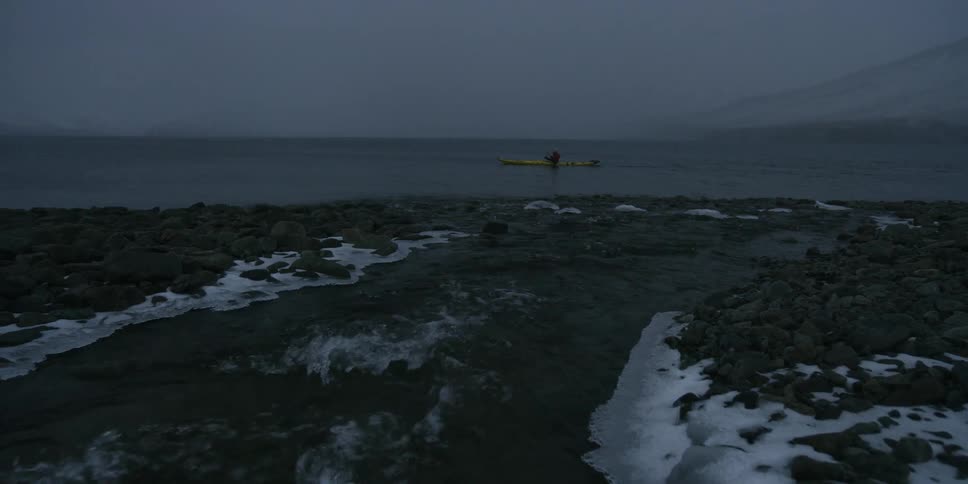 Kayaking in the sea in winter