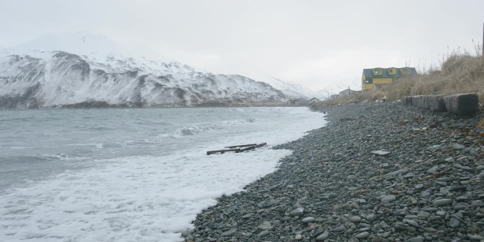 Waves wash ashore in winter