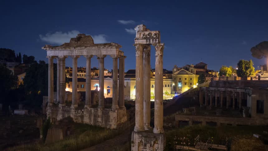 Ruins in the middle of a city at night