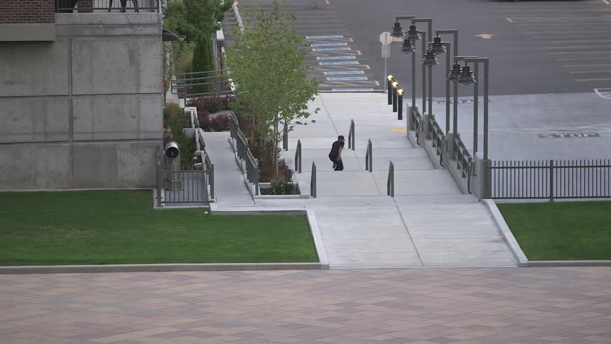 A person skateboarding outdoors