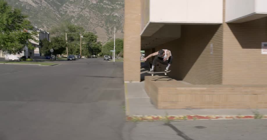 A person is skating in a city
