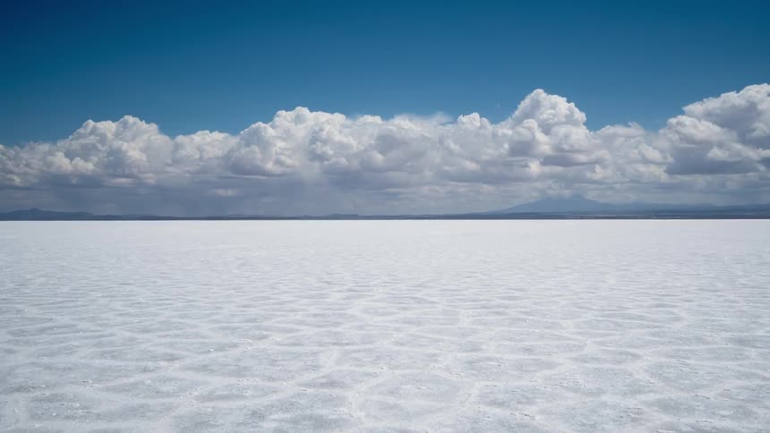 Clouds float over salt flats