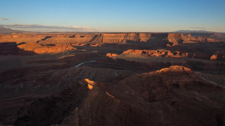 Shadow travels across the canyon