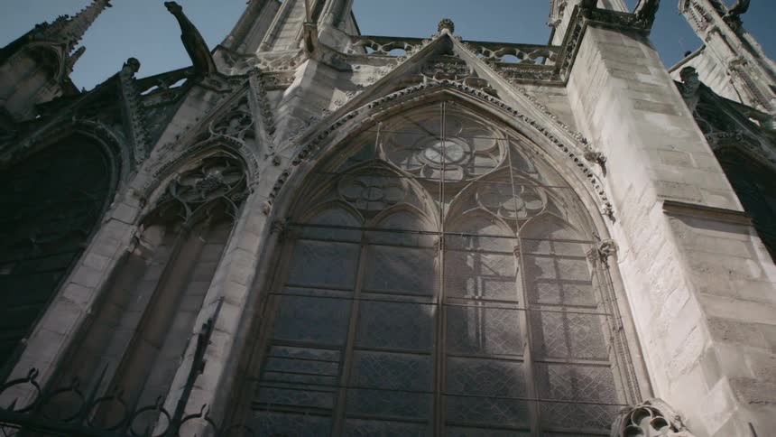A stone cathedral towers overhead